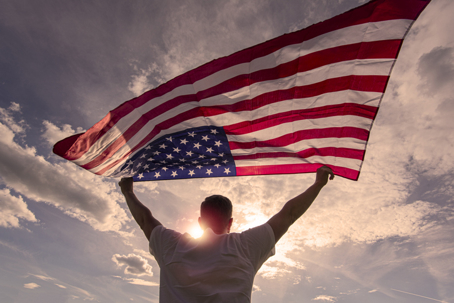 guy holding an american flag
