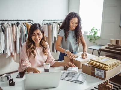 two ladies working a business