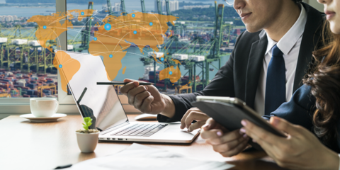 man and woman at computer