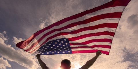 guy holding an american flag