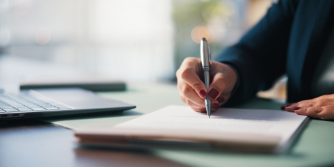 Office, approval and hands with document, signing and employee with terms or investment opportunity. Business, accountant and person with legal paperwork, table and agreement for financial records