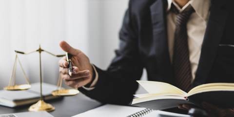 Concept of legal justice. Lawyer is working in a law firm.