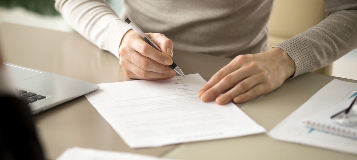 person filling out an application