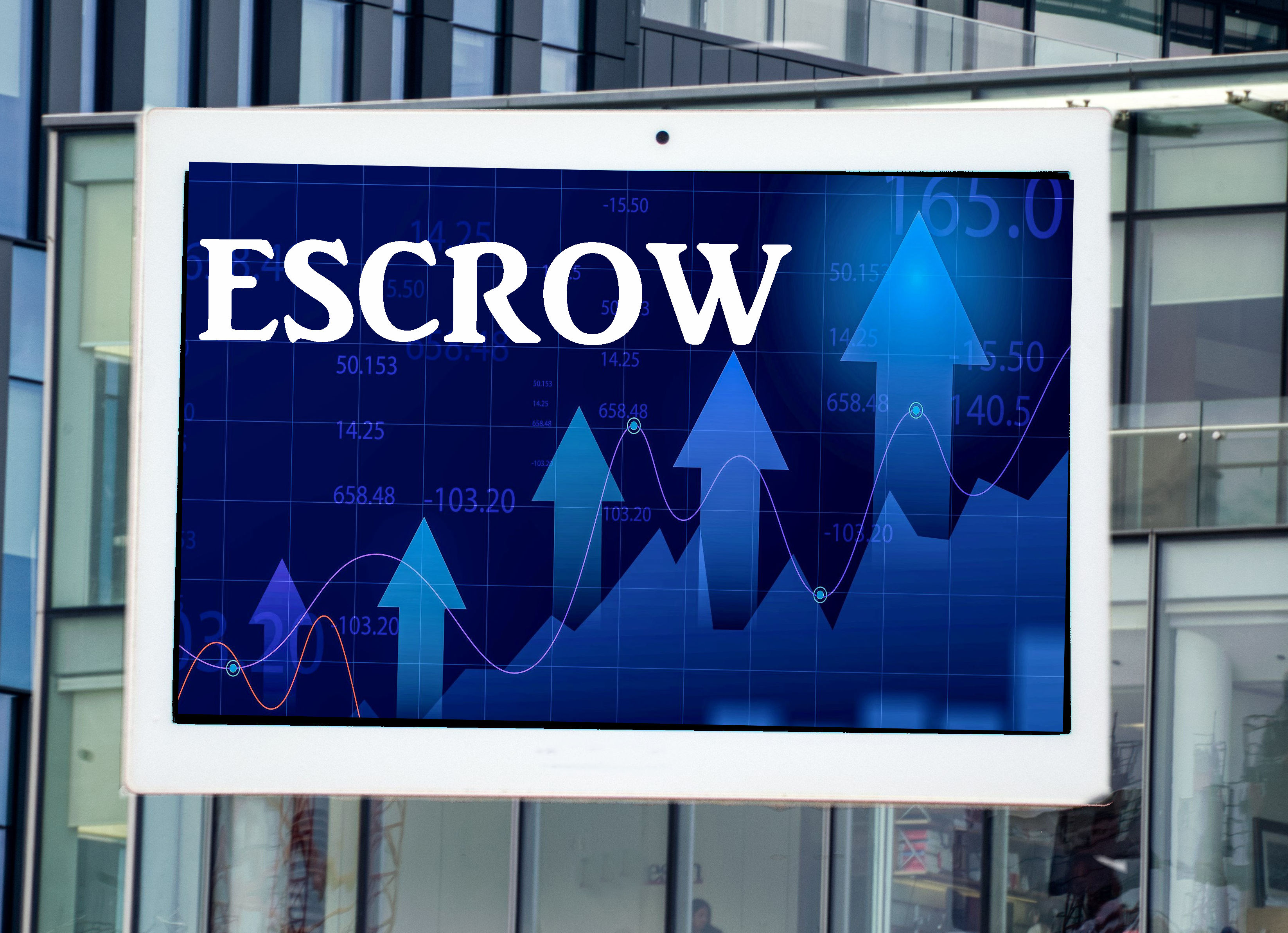 a digital display tablet with the word escrow and modern office building in the background