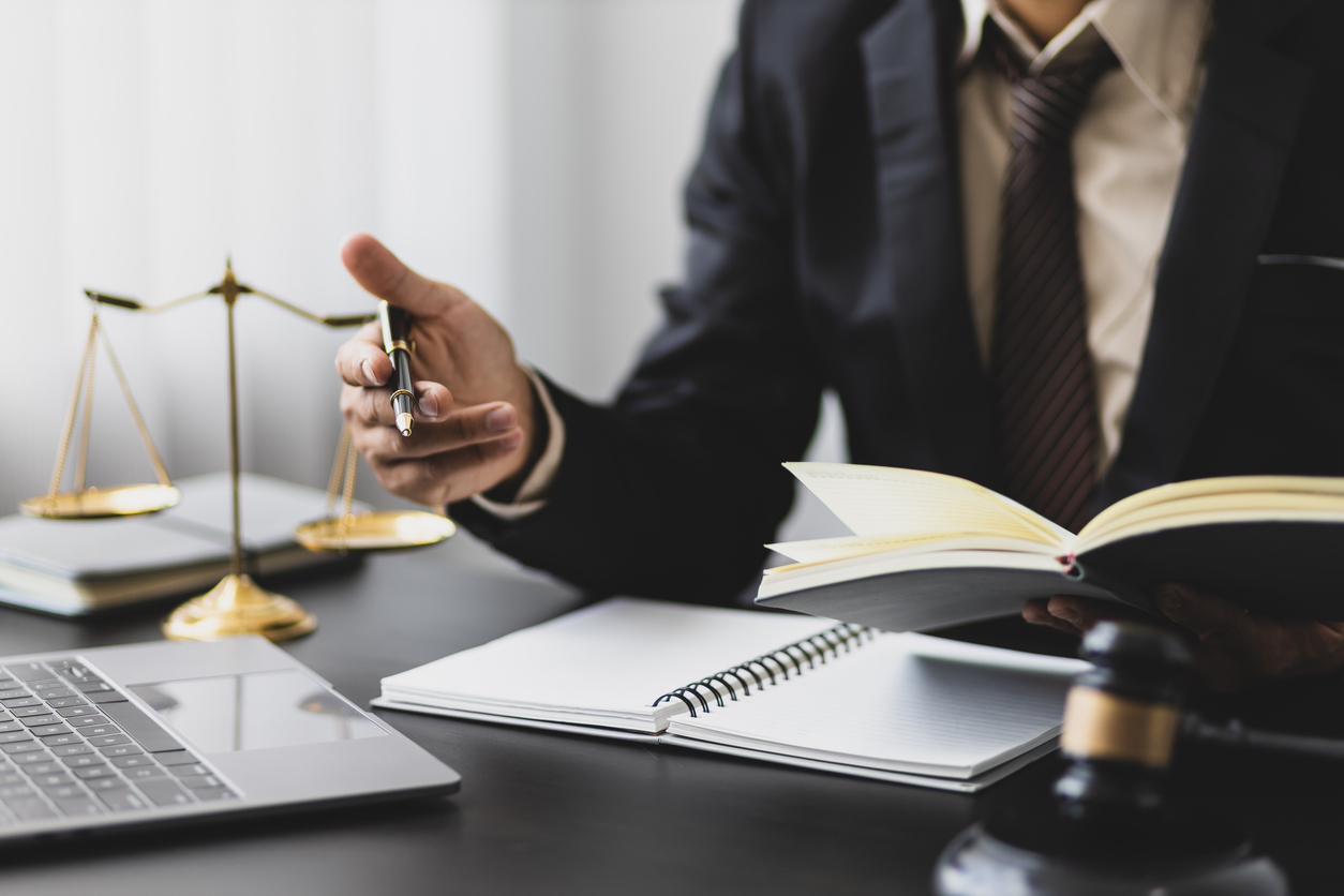 Concept of legal justice. Lawyer is working in a law firm.